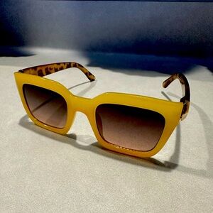 Sunglasses Images Premium Eyewear, Yellow Rimmed, Cheetah‎ detail.